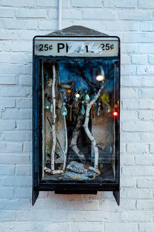 An old payphone that has been turned into an art-installation
