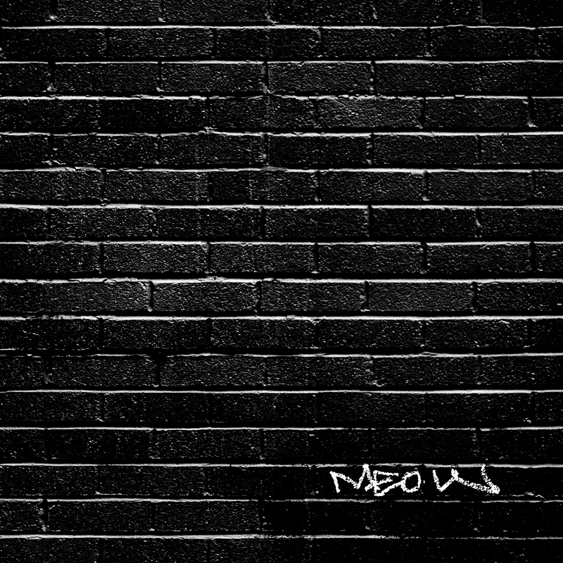 A heavily-edited image of a brick wall with graffiti on it that says "meow"